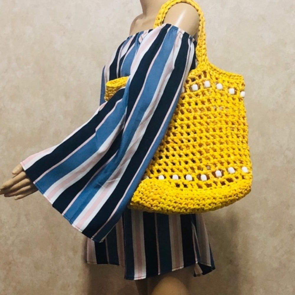 Yellow plastic recycle beach bag